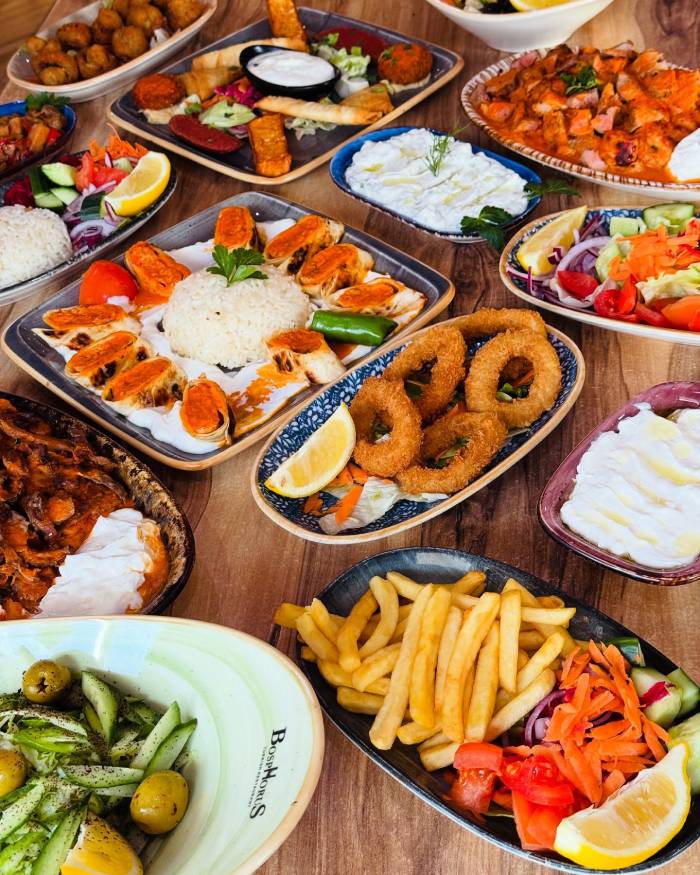 a wide range of Turkish food served on a table at Bosphorus Istanbul Restaurant in Coventry